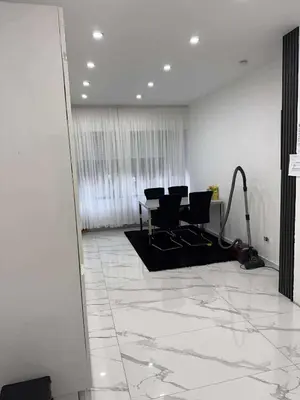 a living room with a table and chairs in it at House for TOMMORLAND 700 m in Boom 2850 in Boom