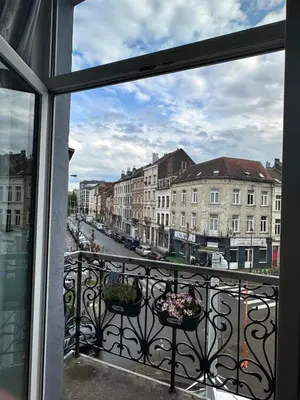 a view of a city street from a balcony at Midi Retreat in Brussels
