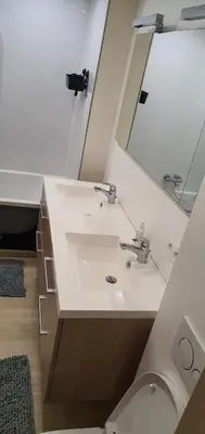 a bathroom with a sink and a mirror and a toilet at Tomorrowlandhome Boom in Boom