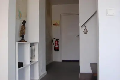 a hallway with a fire hydrantacistacistacistacistacist at Bvba Bacana in Rotselaar