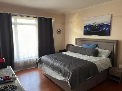 a bedroom with a bed and a window at Dream home for tomorrow land in Boom