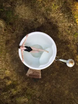 an overhead view of a bowl of water with a spoon at Knuscabin in Lille