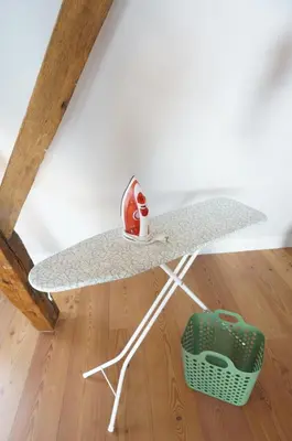 a table with a shoe sitting on top of it at Charming duplex apartment with spectacular views in Antwerp