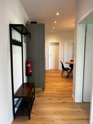 a living room with a fire extinguisheracistacistacistacist at Holiday House Nature in Lier