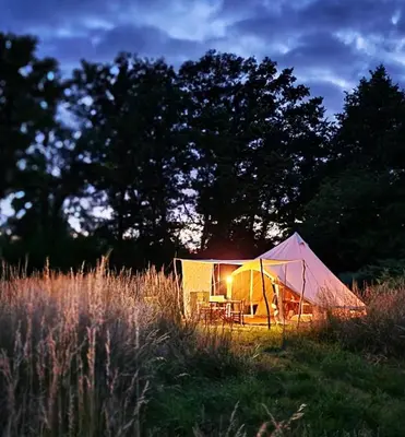 a tent in the middle of a field at Strackxhoeve Veldtent 'Veldslaap' in Laakdal
