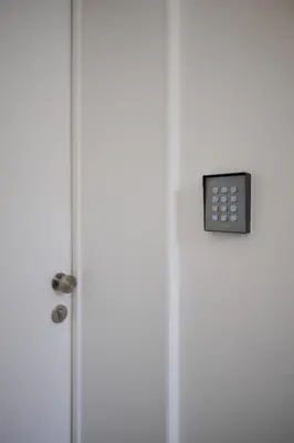 a door with a remote control on top of it at Apartment Wiels 3 in Brussels