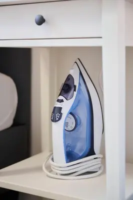 a blue and white appliance sitting on a table at Apartment Wiels 3 in Brussels