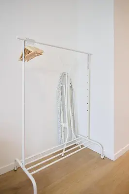 a mirror on a stand in a room at Apartment Berthelot 5 in Brussels