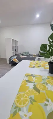 a room with a floor with yellow and white flowers at CitySpot 159 in Brussels