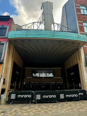 a store front of a building in a city at Studio cozy et charmant in Brussels