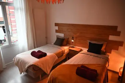 two beds in a hotel room with two beds at P60 Character & Comfort in 1000 Brussels in Brussels