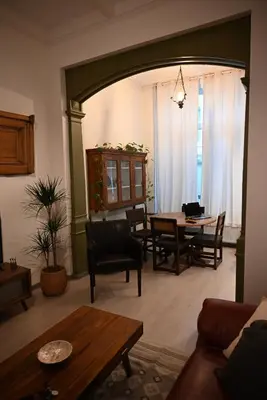 a living room with a table and chairs at P60 Character & Comfort in 1000 Brussels in Brussels
