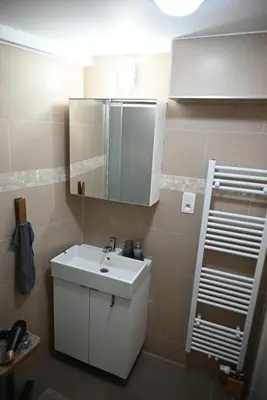 a bathroom with a white sink and a mirror at P60 Character & Comfort in 1000 Brussels in Brussels