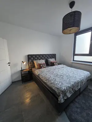 a bedroom with a bed and a window at Nord center 1G in Brussels