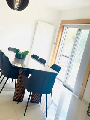 a dining room with a table and chairs at Villa-gey Escape in Bekkevoort
