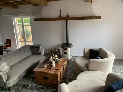 a living room with two couches and a coffee table at The Oak & Squirrel Villa in Hoogstraten