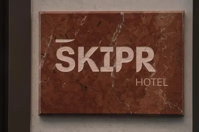 a sign with the word skippel on a wall at SKIPR Hotel - adults only in Antwerp