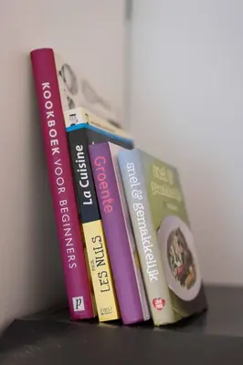 a group of books sitting on top of a table at Studio in Brussels in Brussels