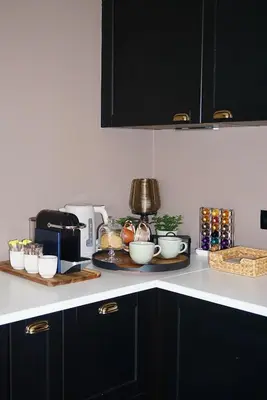 a kitchen counter top with bowls and other items on it at B&B by Delizia met mogelijkheid tot bijhuren van privé wellness in Rumst