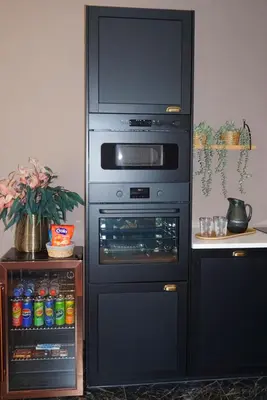 a kitchen with an oven next to a counter at B&B by Delizia met mogelijkheid tot bijhuren van privé wellness in Rumst
