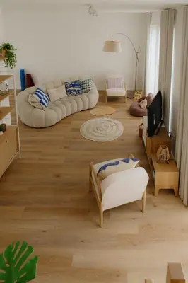 a living room with two couches and a tv at Boutique Guesthouse - Private Top floor - 3 rooms - host on site available in Ghent