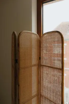 two wicker chairs sitting next to a window at Boutique Guesthouse - Private Top floor - 3 rooms - host on site available in Ghent