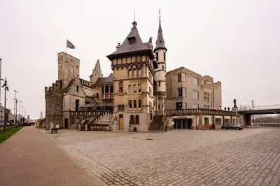 an old castle with a car parked in front of it at SHWAY - The Second Mate's Glance in Antwerp