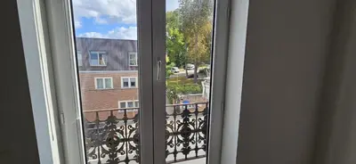 a window with a view of a building at Wonderful Brussels in Uccle in Brussels