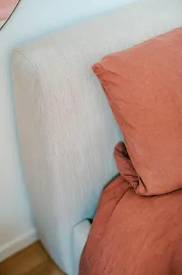 a close up of a bed with a pillow at Slow Moments in Brussels in Brussels