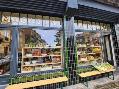 a store front of a bakery with a display window at Slow Moments in Brussels in Brussels