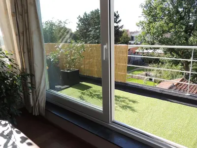 a window with a view of a garden at Fokus time out 2 in Dessel