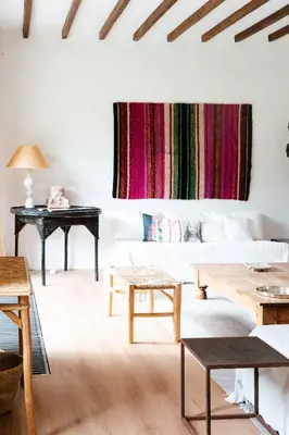 a living room with white furniture and a table at Le Paddock by Ernesst in Lubbeek