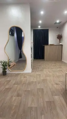 a large room with a mirror on the wall at Maison Soleya Brussels, private spa and love room in Asse