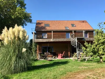a house with a metal roof at Aan de Jordaan in Boutersem