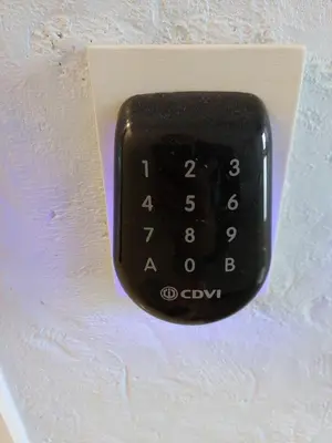 a black remote control attached to a wall at Albert 2 - Basic Room in Mechelen