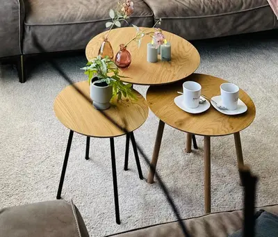 two wooden tables with coffee cups and plants on them at Guesthouse Eekhoorn 16 in Kasterlee