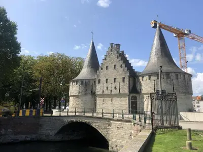 a castle sitting on top of a bridge at Prinsenhof in Ghent