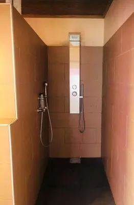 a shower stall in a bathroom with a shower at Prinsenhof in Ghent