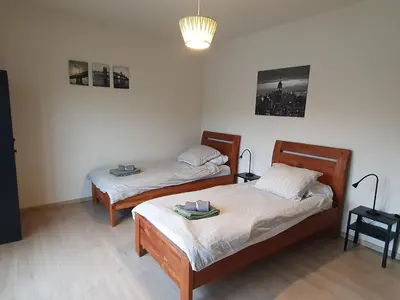 a room with two beds in a room at Laaglandlaan 1 in Antwerp