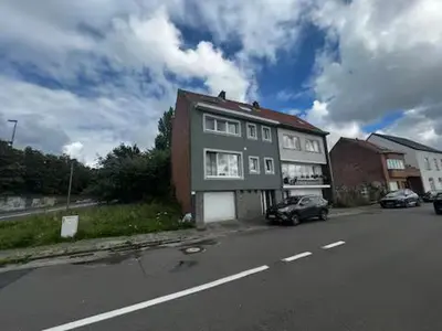 a house on the side of a road with a car at Entire house with excellent accessibility in Machelen