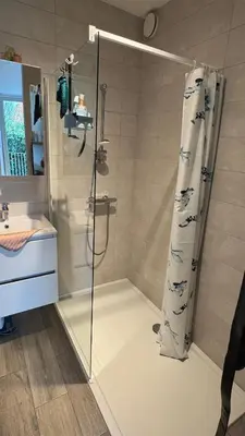 a bathroom with a shower and a sink at Casa Kim in Willebroek