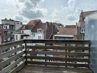 a view of a city from a balcony at Charming Entire Apartment in Saint-Gilles, Brussels in Brussels