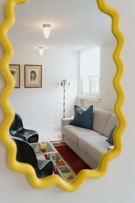 a living room with a couch and a table at Cozy Apartment in Central Antwerp in Antwerp