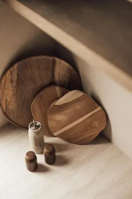 a wooden toilet in the corner of a room at LEO - Antwerp in Antwerp