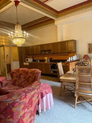 a living room with a couch and a table at Charming apartment in Antwerp in Antwerp