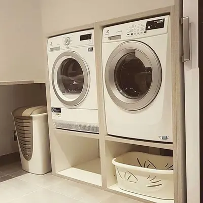 two washers and a dryer in a kitchen at Cosy EU Apartment - Central, Parking, Terrace in Brussels