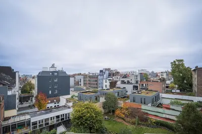 an aerial view of a city with buildings at Brussels Louise Design residence in Brussels