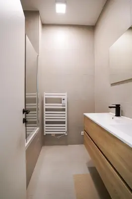 a bathroom with a sink and a shower at Appartment Wayez 3 in Brussels