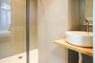 a bathroom with a sink and a shower at Appartment Astrid 4 in Brussels