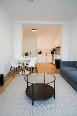 a living room with a couch and a table at Appartment Astrid 4 in Brussels